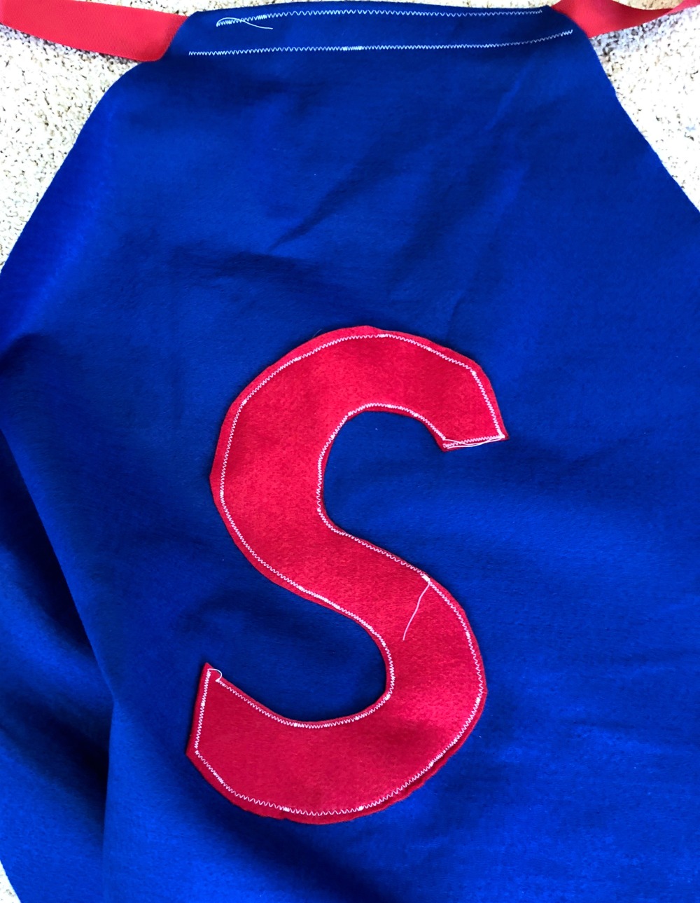 Stitched Letter on Cape
